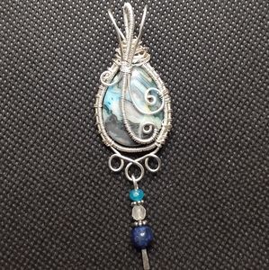 Silver wire wrapped blue crazy lace agate pendant